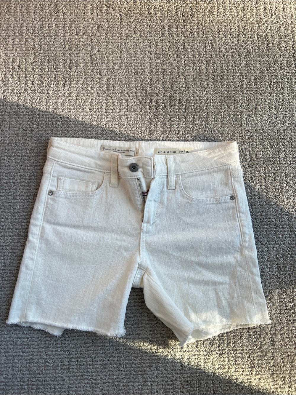 Anthropologie white denim cutoff shorts